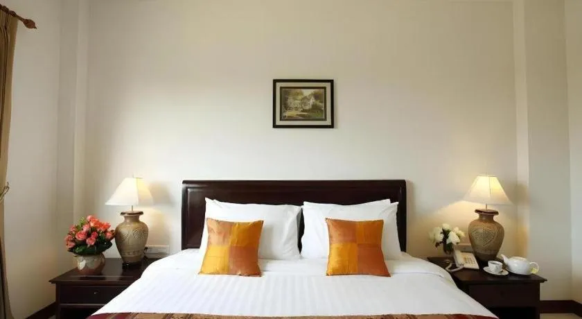 Bed in Lao Golden Hotel