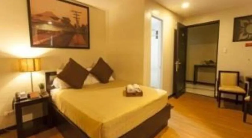 Bed in L Square Hotel