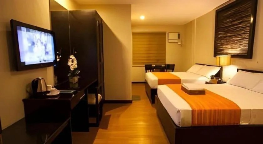 Bed in L Square Hotel