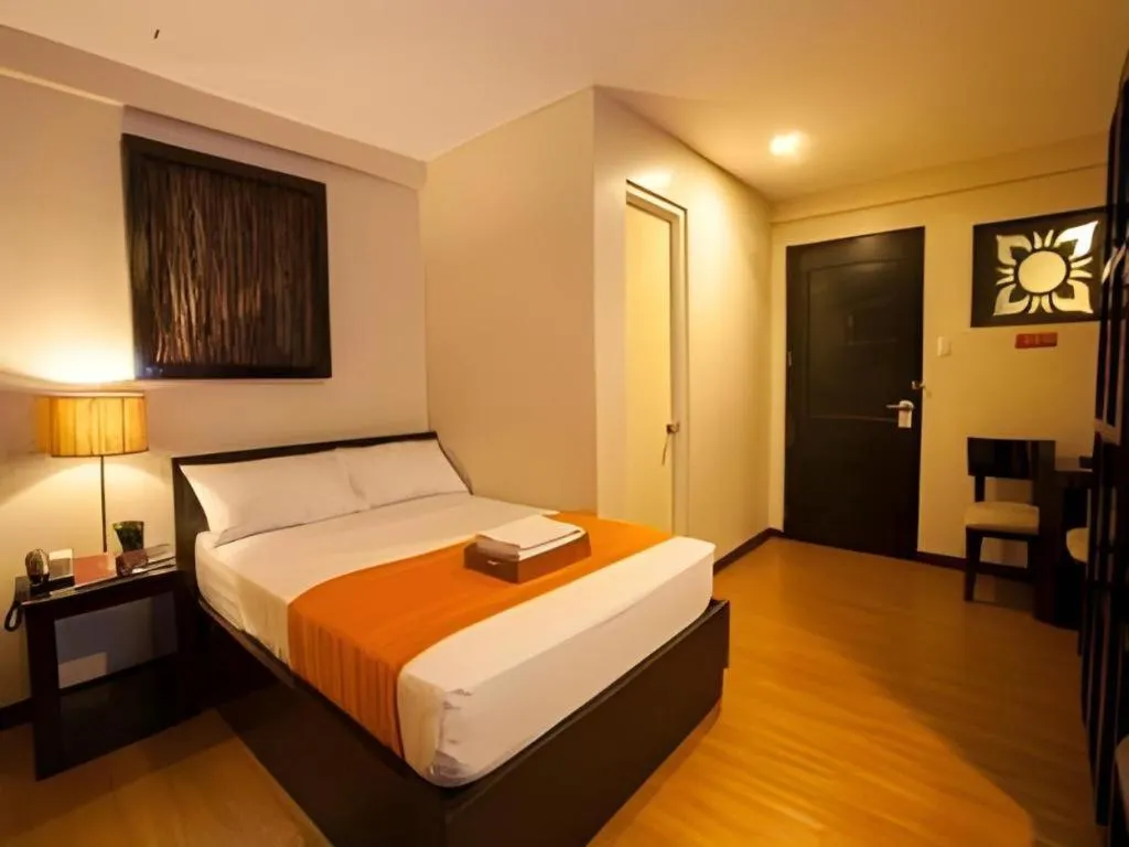 Bed in L Square Hotel