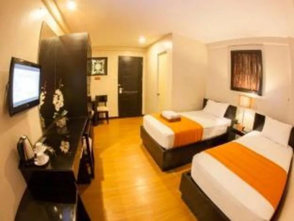 Bed in L Square Hotel