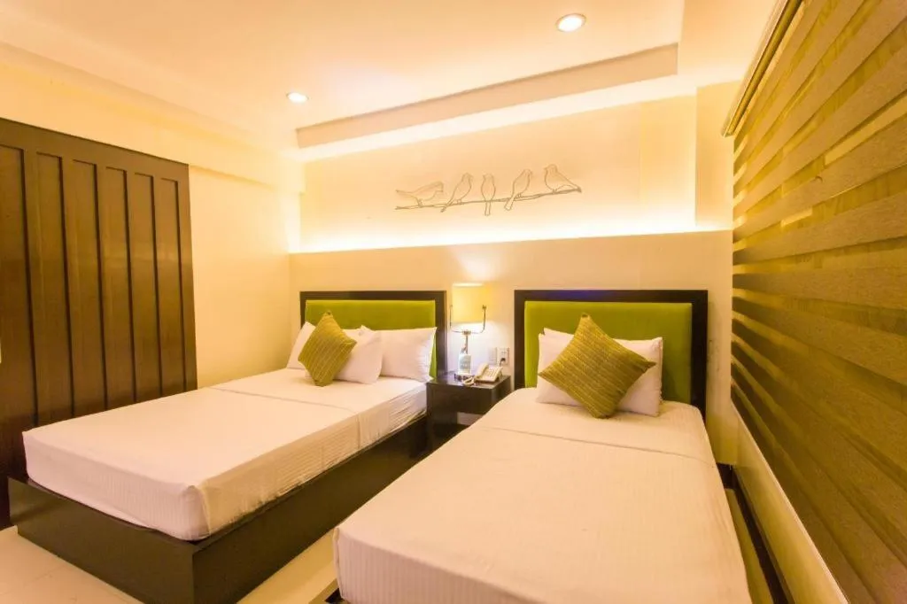 Bed in L Square Hotel