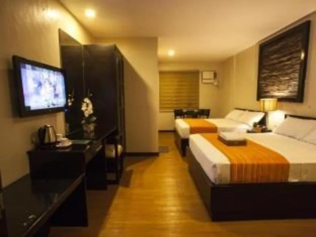 Bed in L Square Hotel