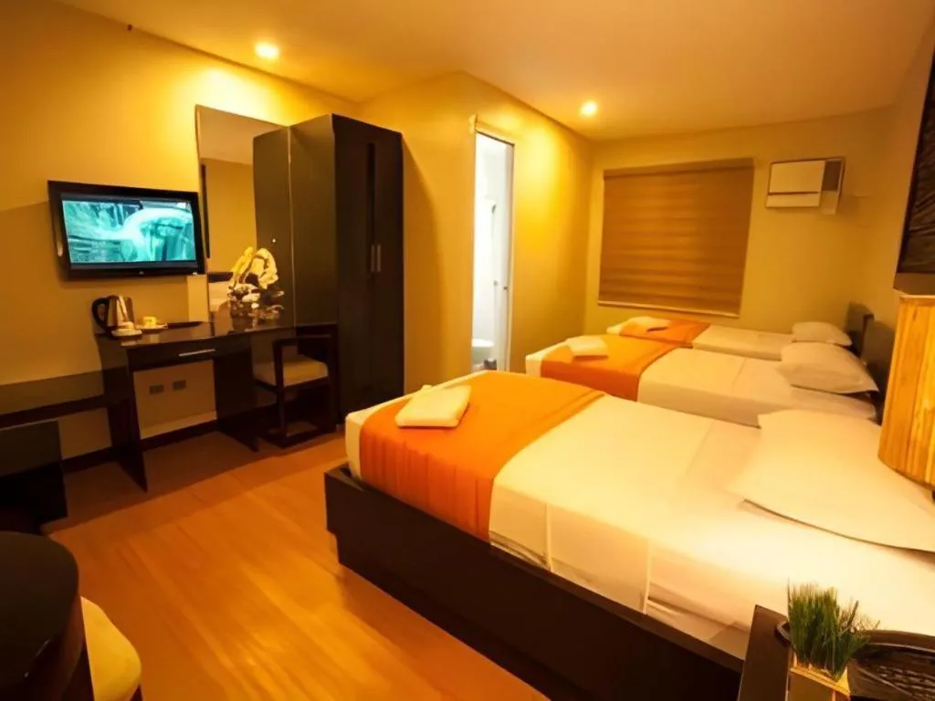 Bed in L Square Hotel