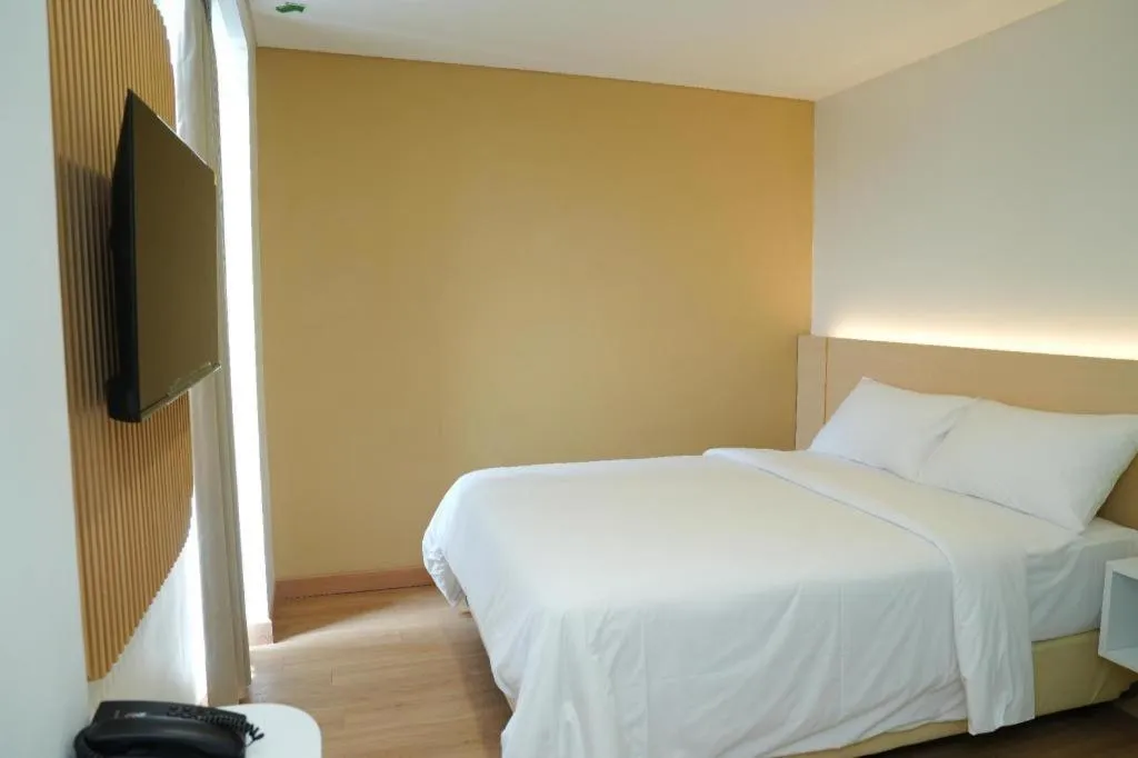 Bed in Clay Hotel Jakarta