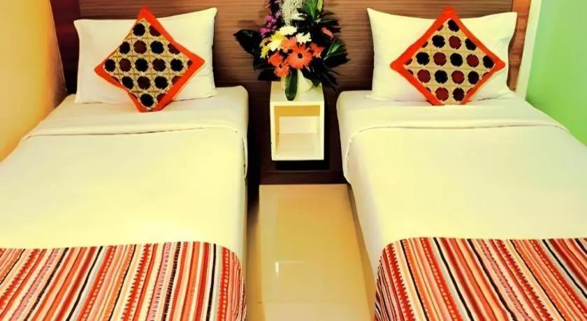 Bed in Clay Hotel Jakarta