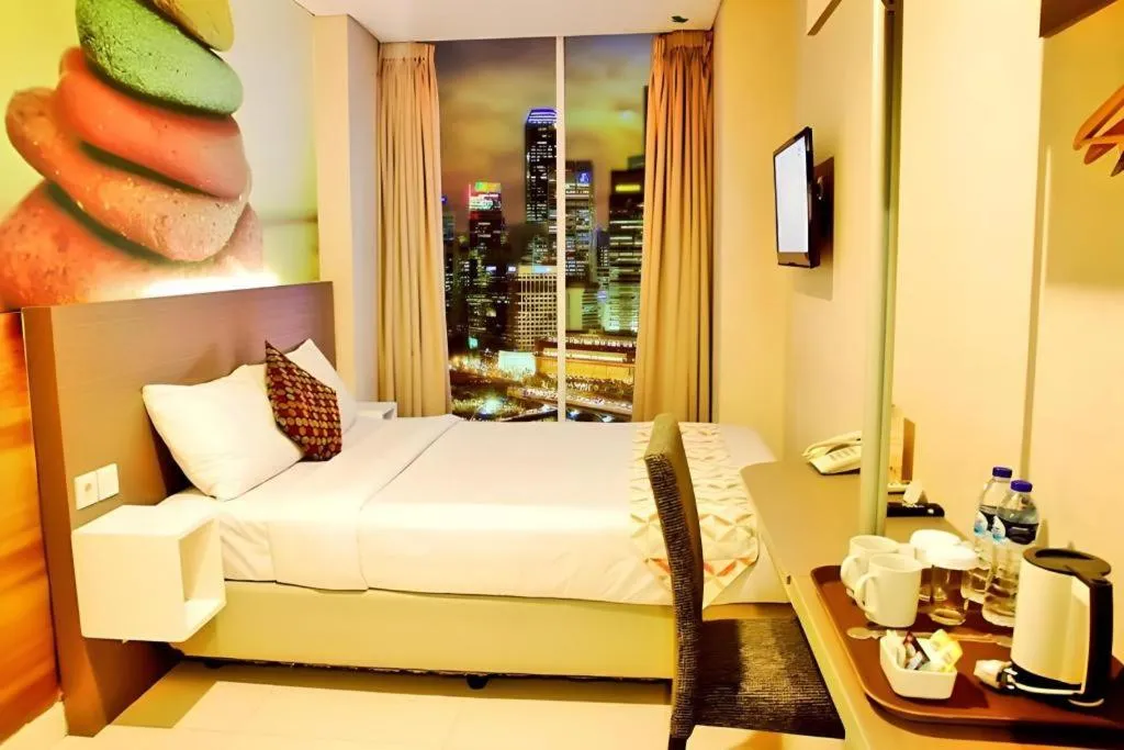 Bed in Clay Hotel Jakarta