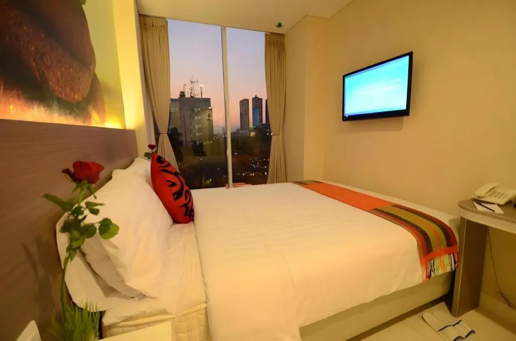 Bed in Clay Hotel Jakarta