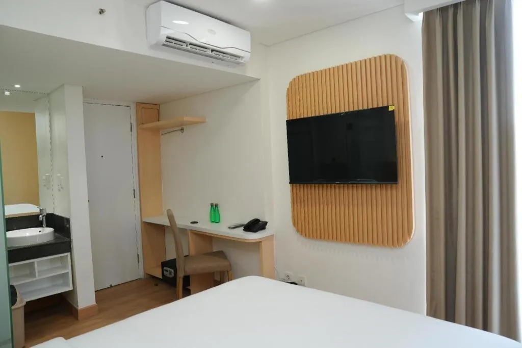 Bed in Clay Hotel Jakarta