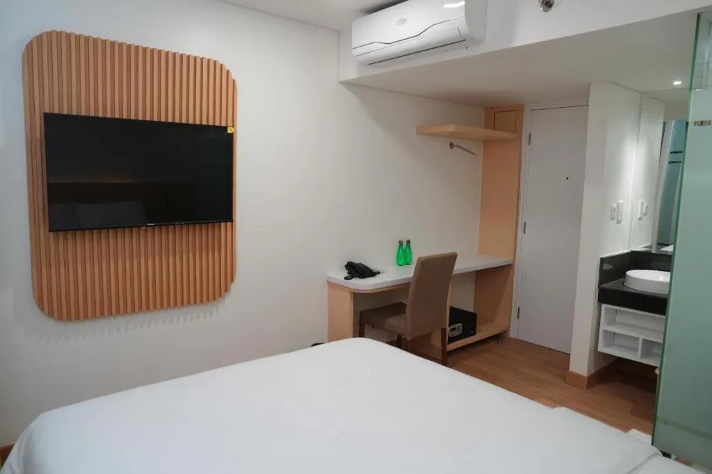 Bed in Clay Hotel Jakarta