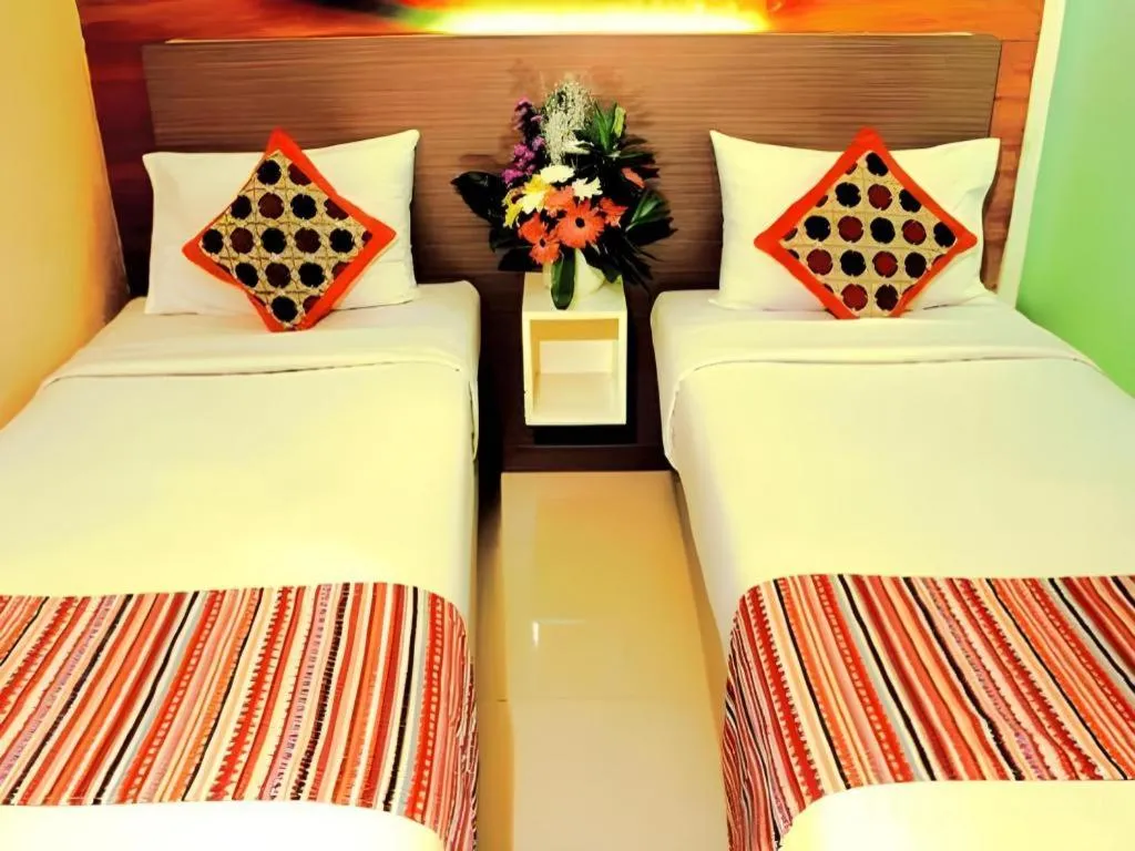 Bed in Clay Hotel Jakarta