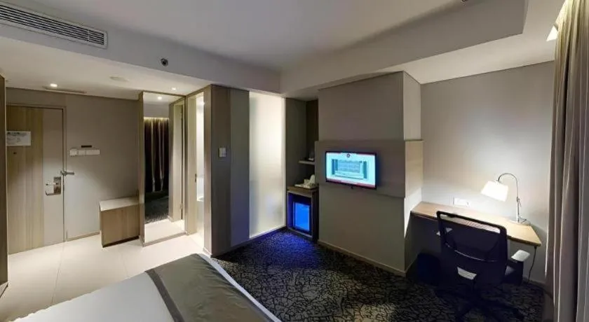 Bed in Hotel GranDhika Iskandarsyah