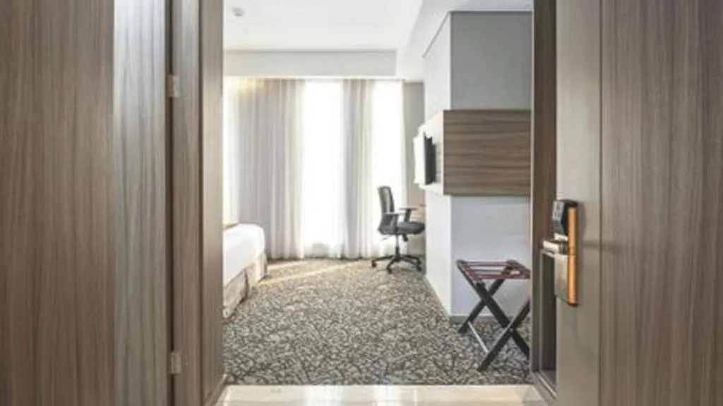 Bed in Hotel GranDhika Iskandarsyah