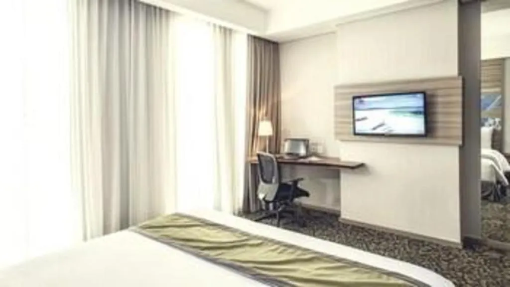 Bed in Hotel GranDhika Iskandarsyah