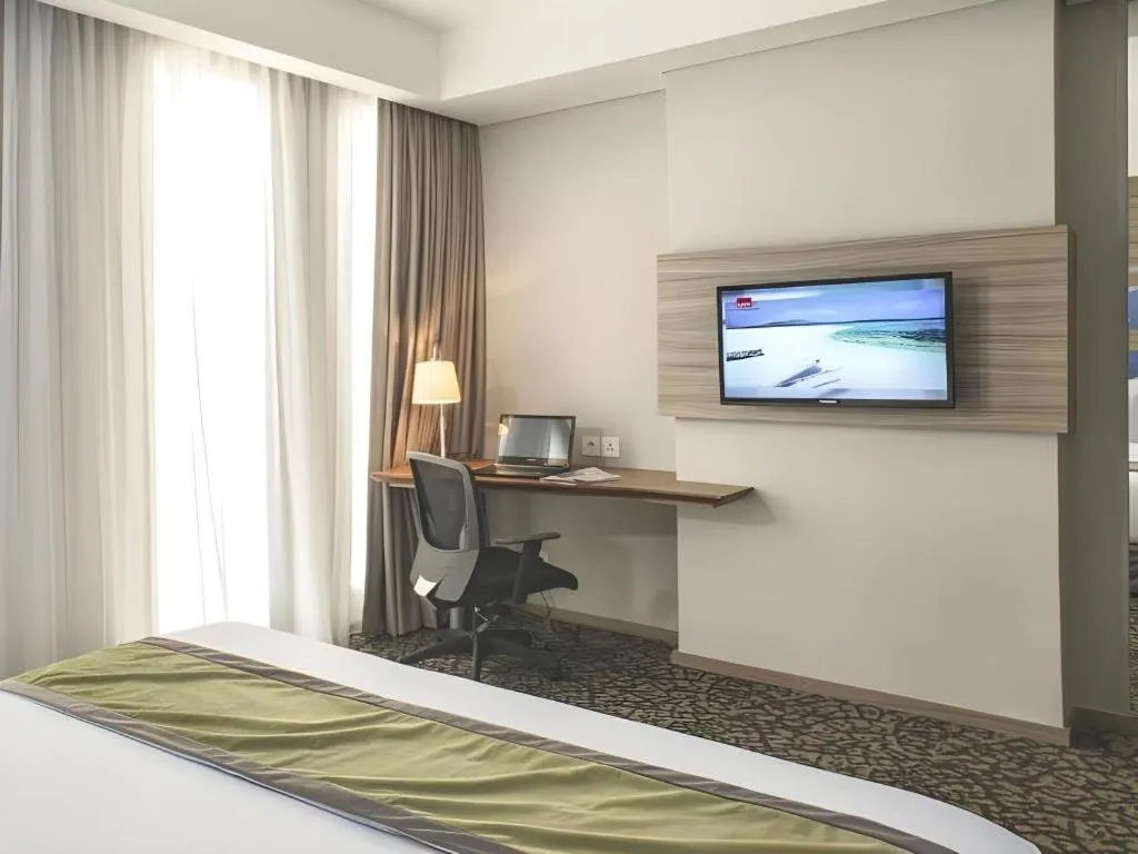 Bed in Hotel GranDhika Iskandarsyah