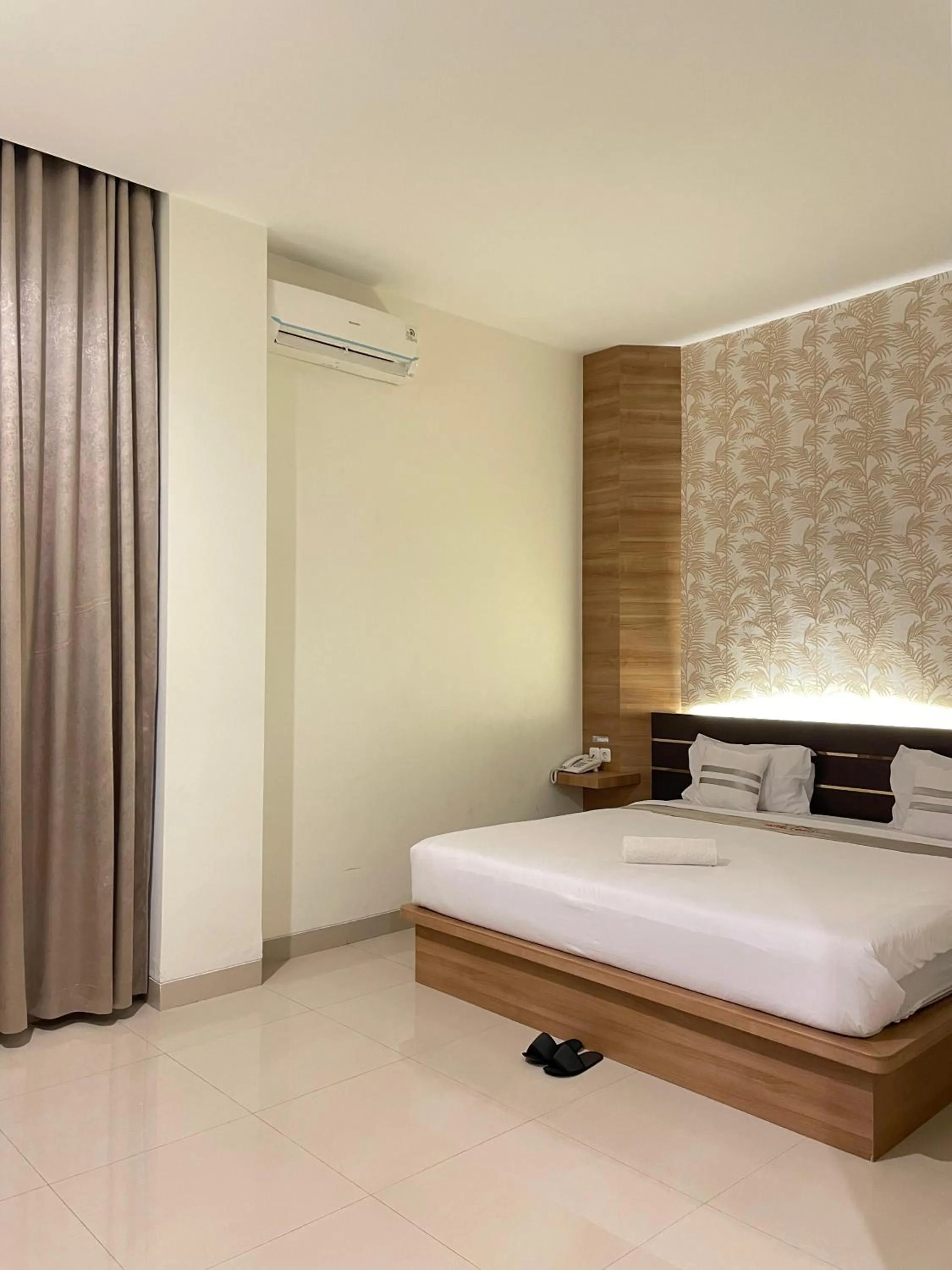 Bed in Hotel Cendana Palu