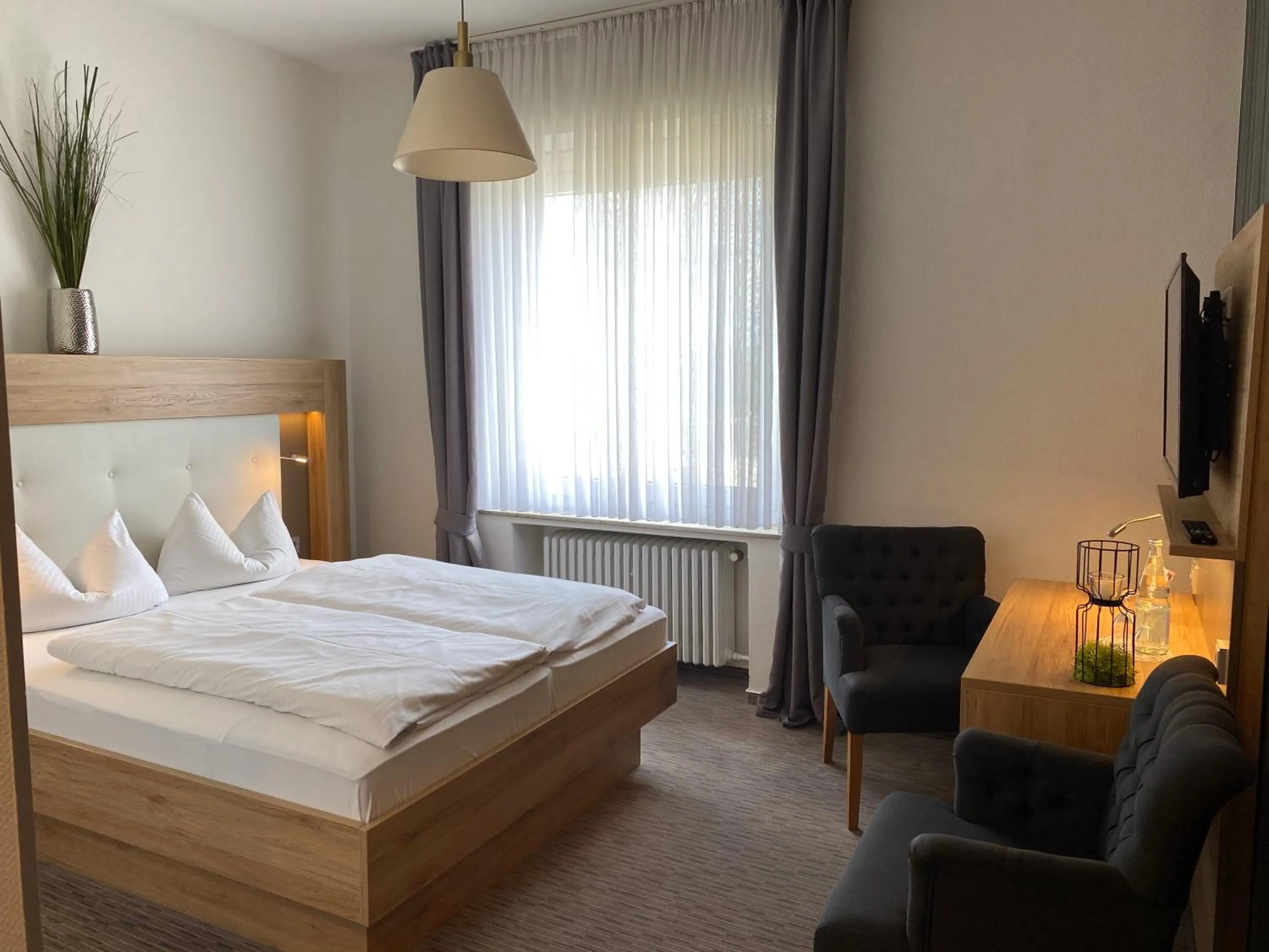 Photo of the whole room, Bed in Weinhotel Römerbad