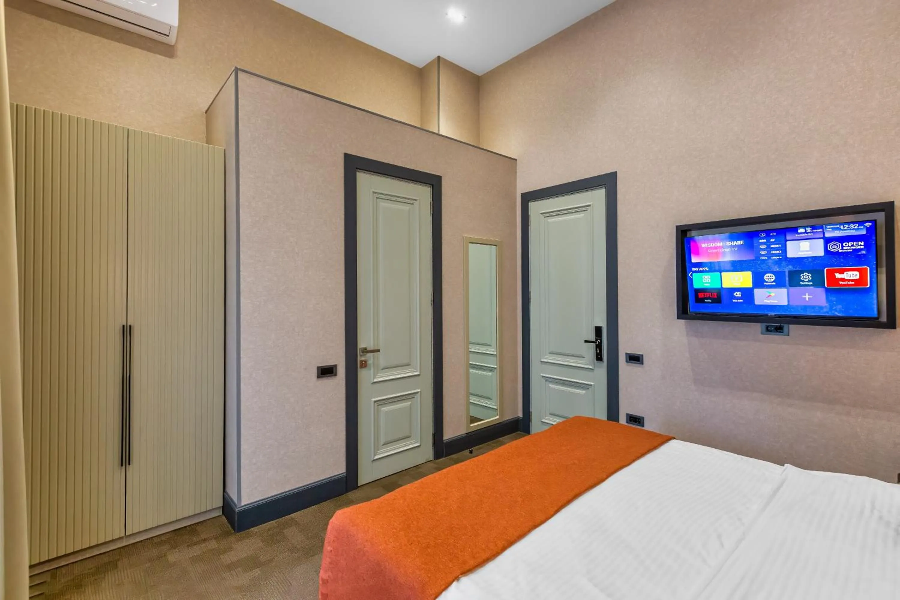 Bed in Nizami Central Park Hotel