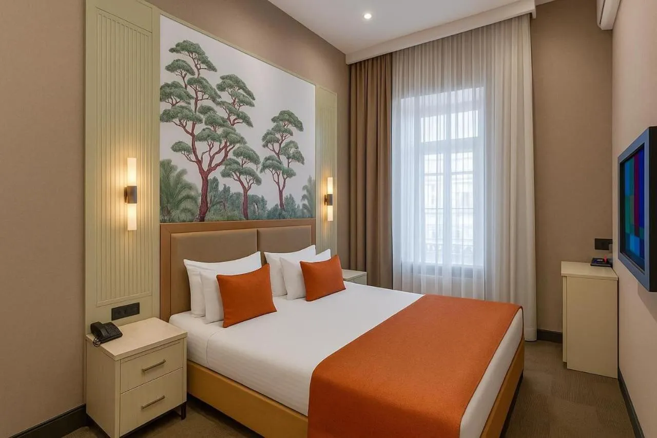 Bed in Nizami Central Park Hotel