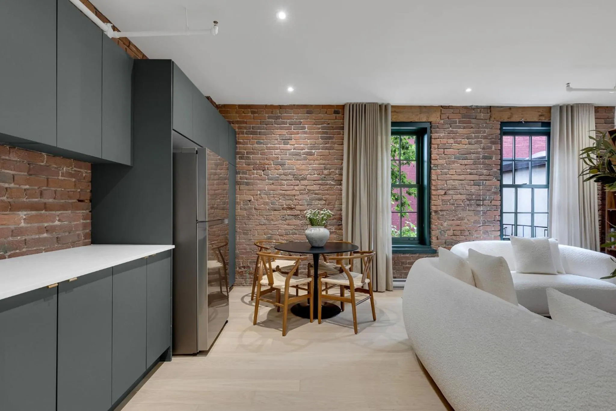 Bed in The Mercer Boutique Hotel