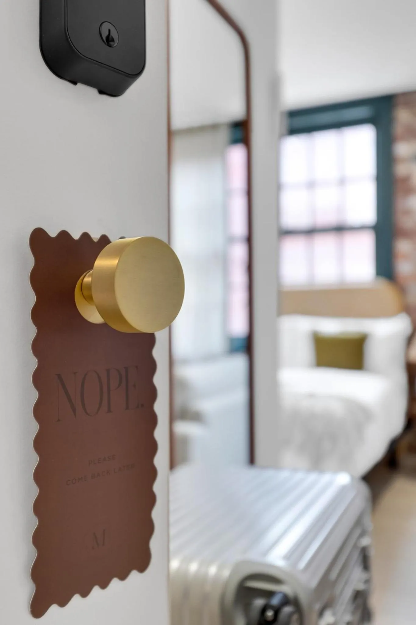 Bed in The Mercer Boutique Hotel