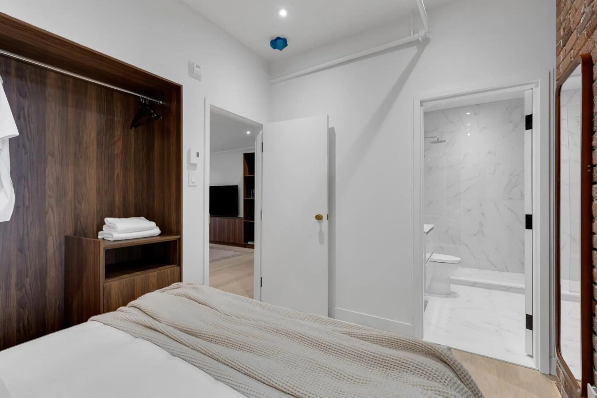 Bed in The Mercer Boutique Hotel