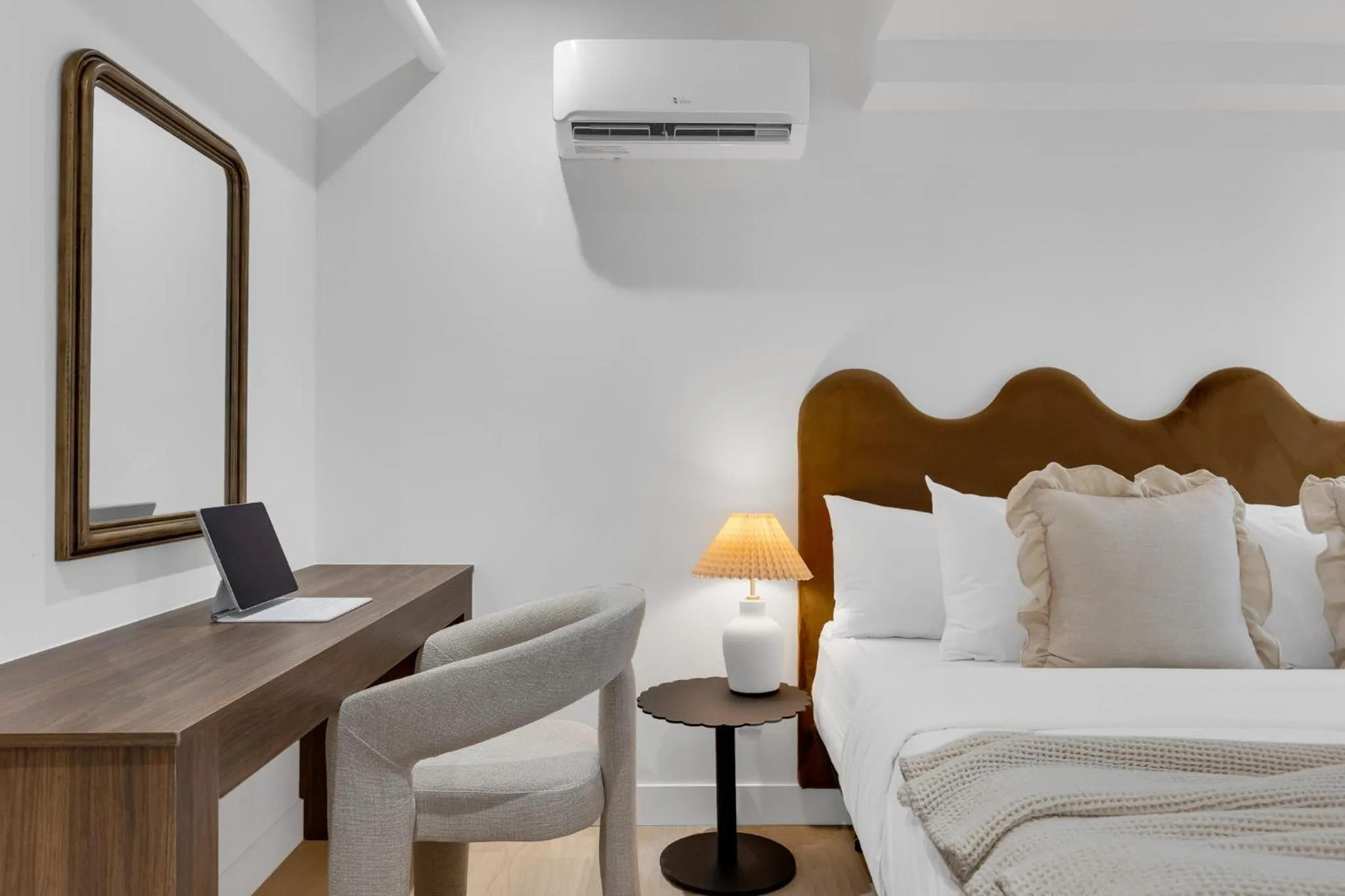 Bed in The Mercer Boutique Hotel