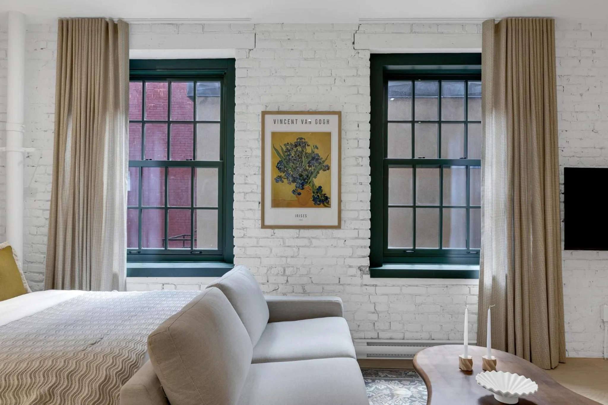 Bed in The Mercer Boutique Hotel