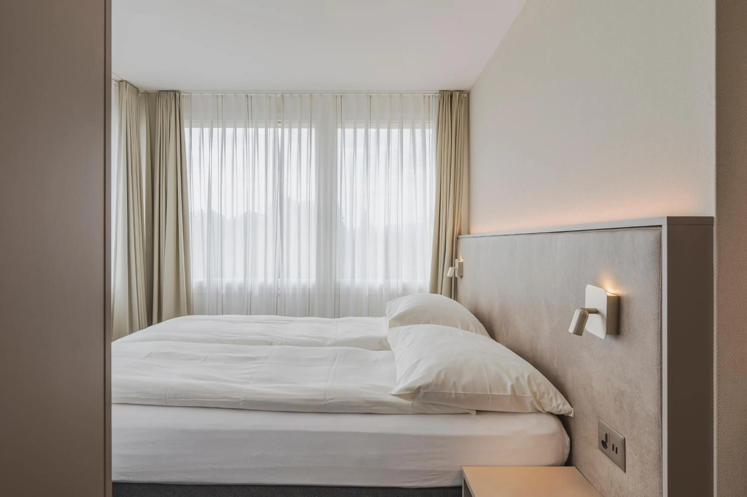 Bed in Amanthos Living Zürich Airport