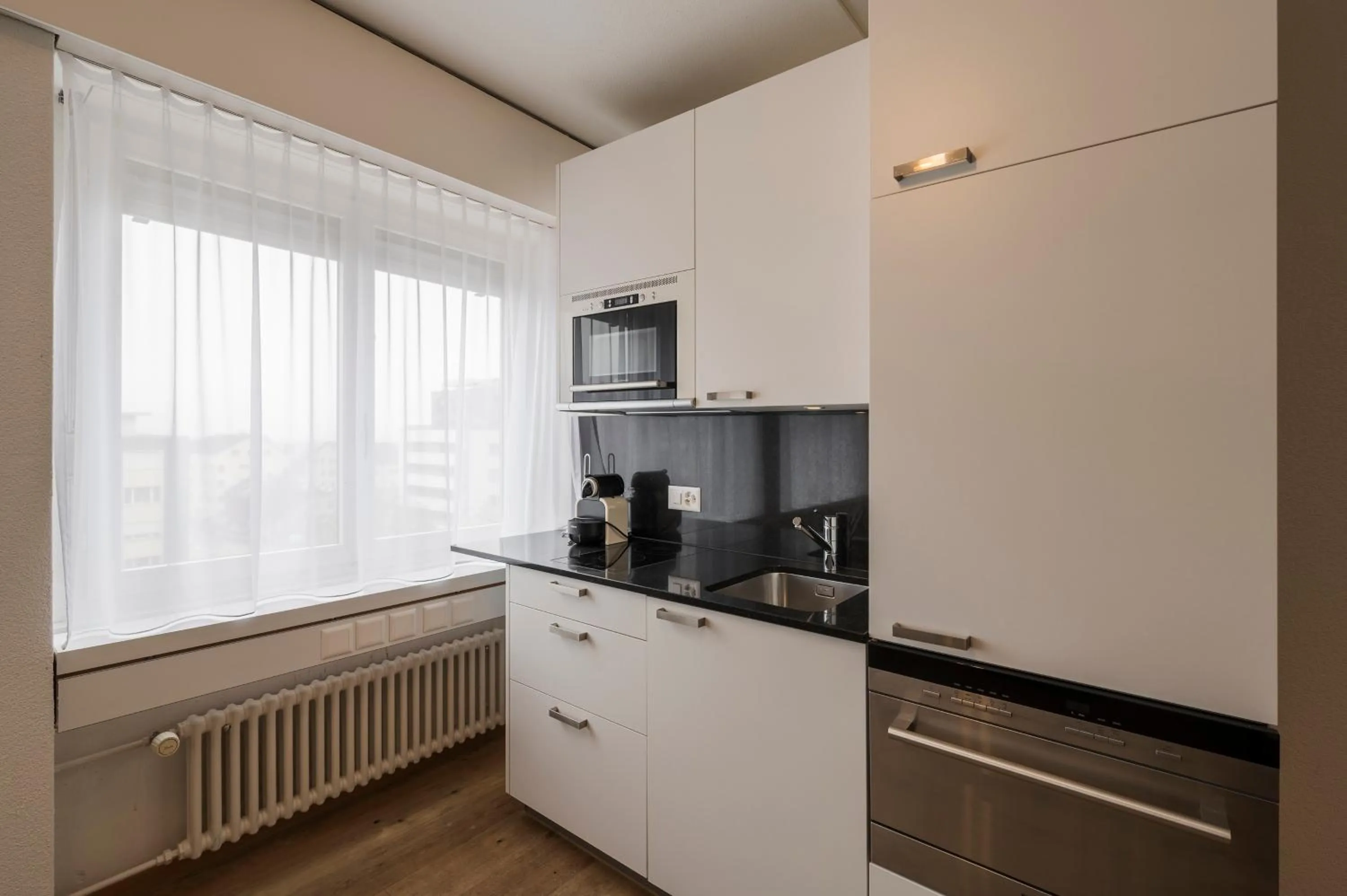 Kitchen or kitchenette in Amanthos Living Solothurn