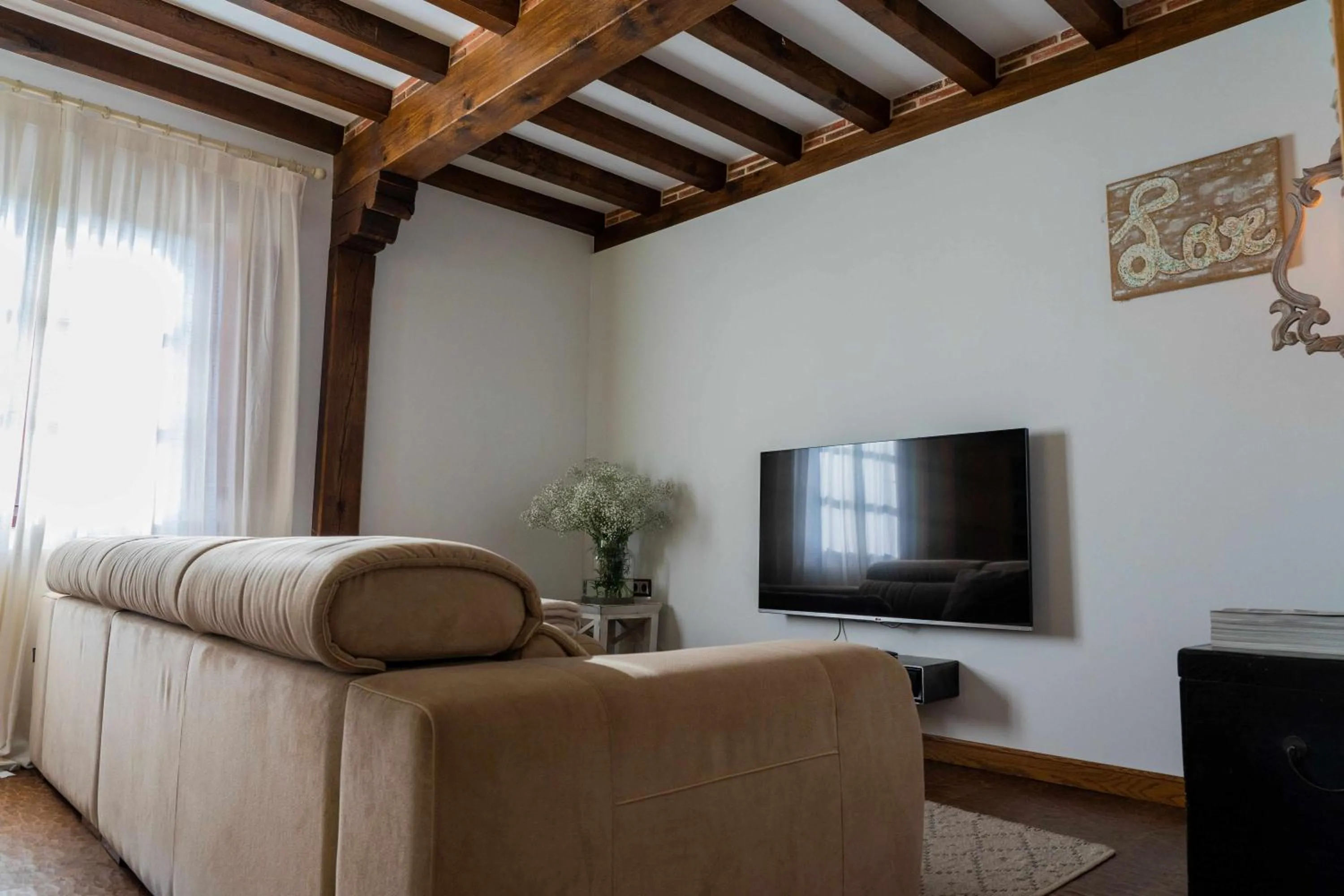 Communal lounge/ TV room in Apartamentos Arcadia