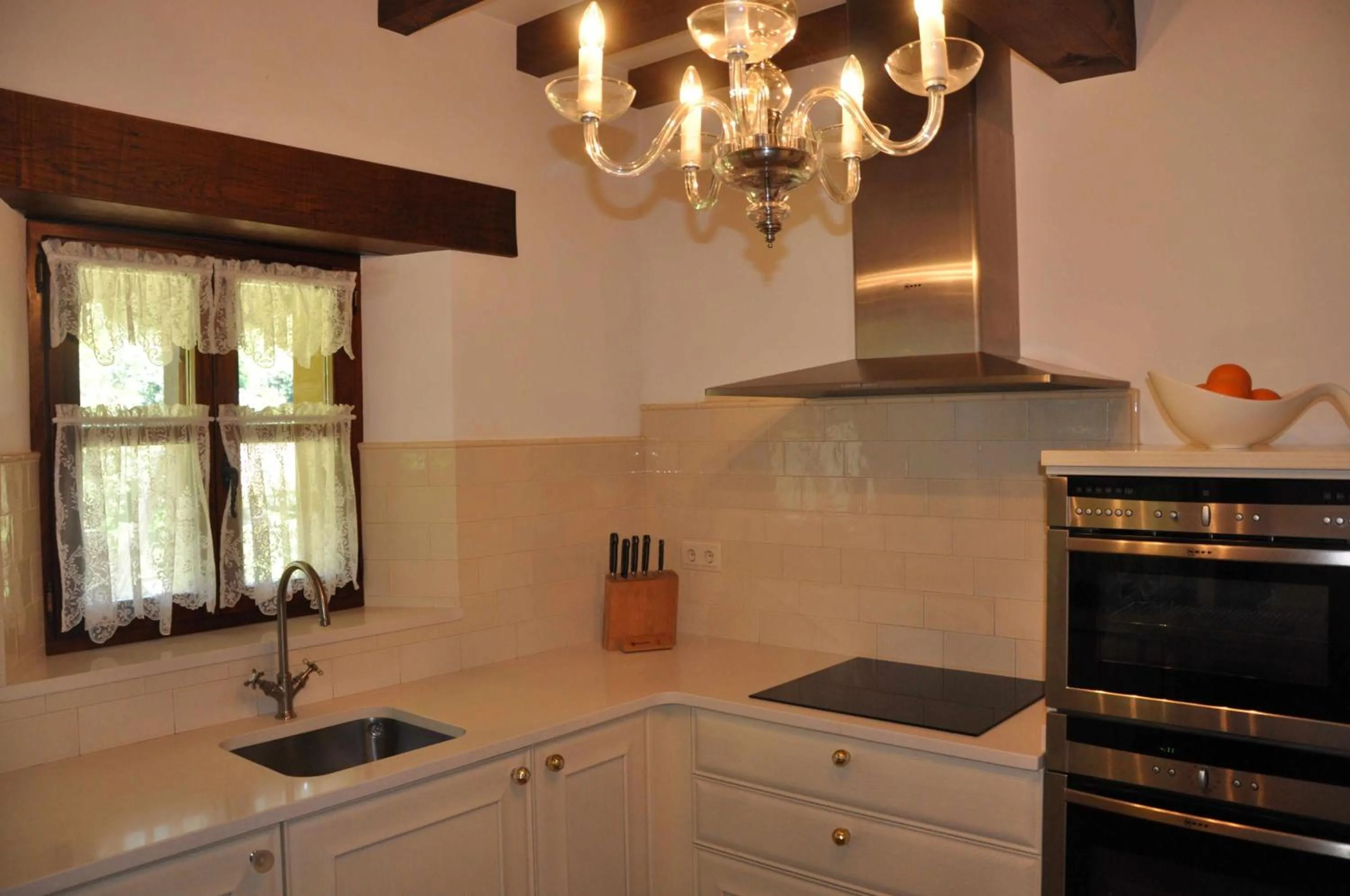 Kitchen or kitchenette in Apartamentos Arcadia