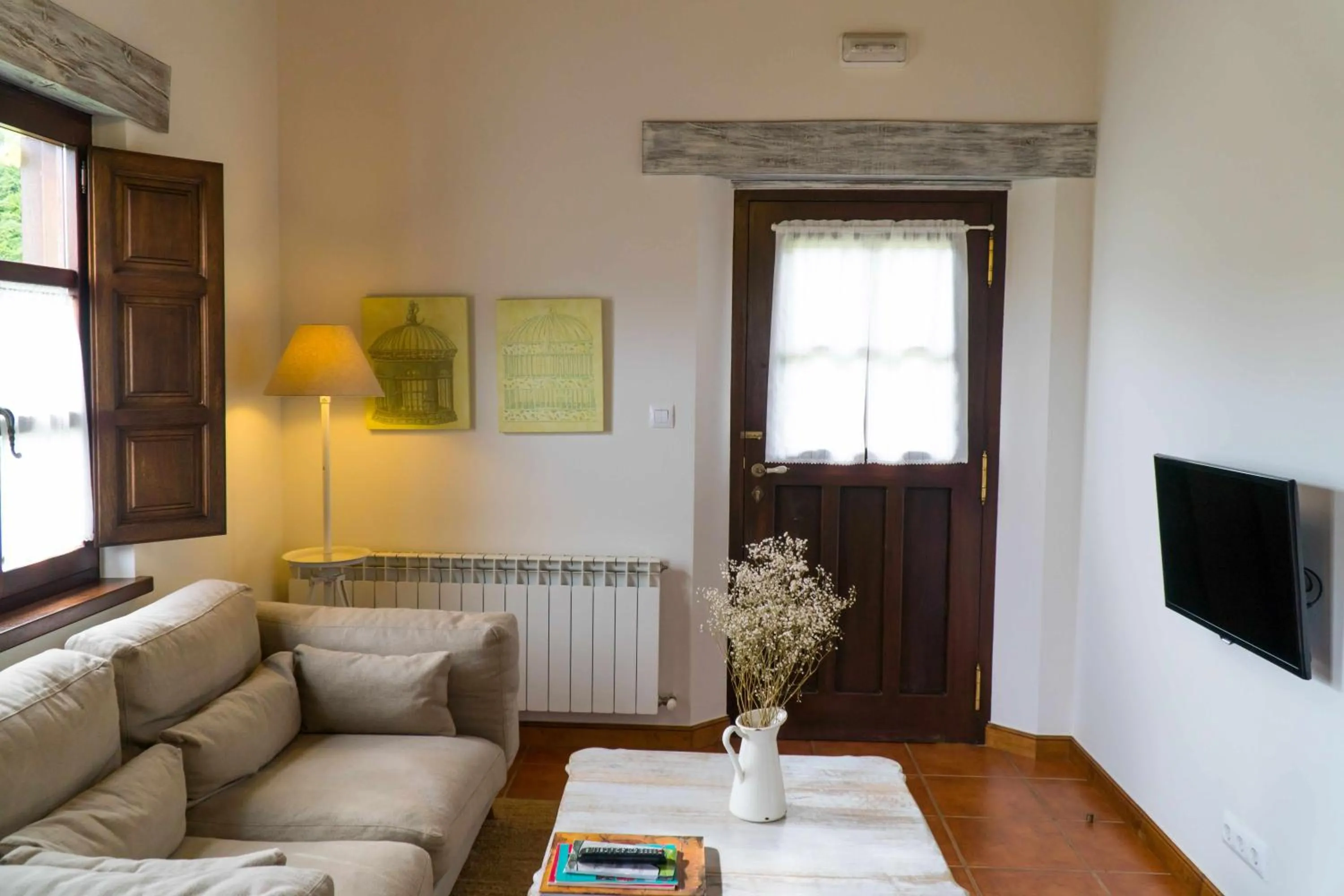 Communal lounge/ TV room in Apartamentos Arcadia