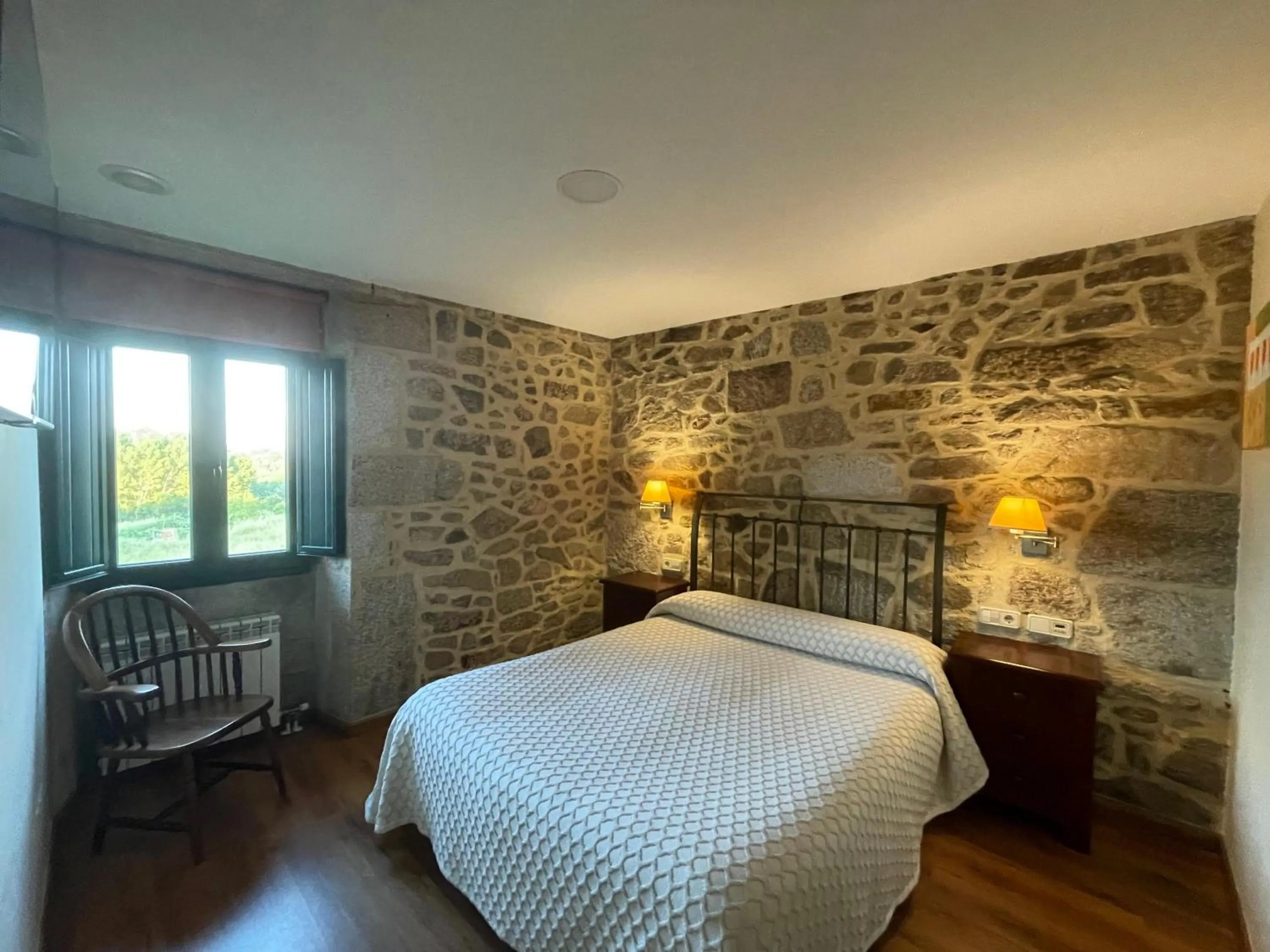 Bedroom, Bed in Apartamentos Río Sil