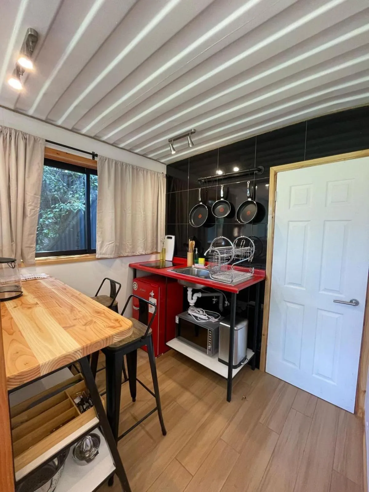 Kitchen or kitchenette in French Andes Apart Hostel