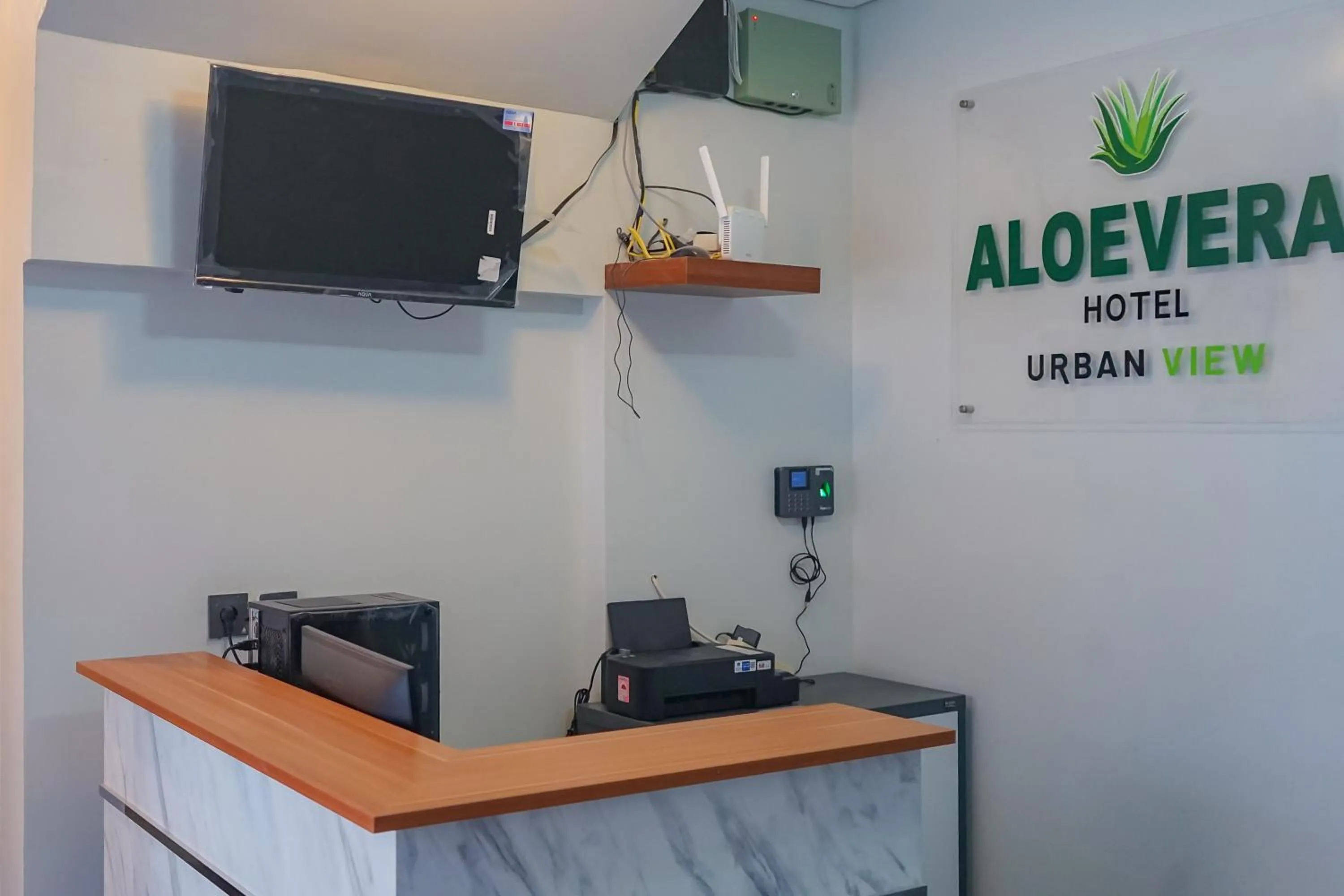 Lobby or reception in Urbanview Hotel Aloevera Pontianak by RedDoorz