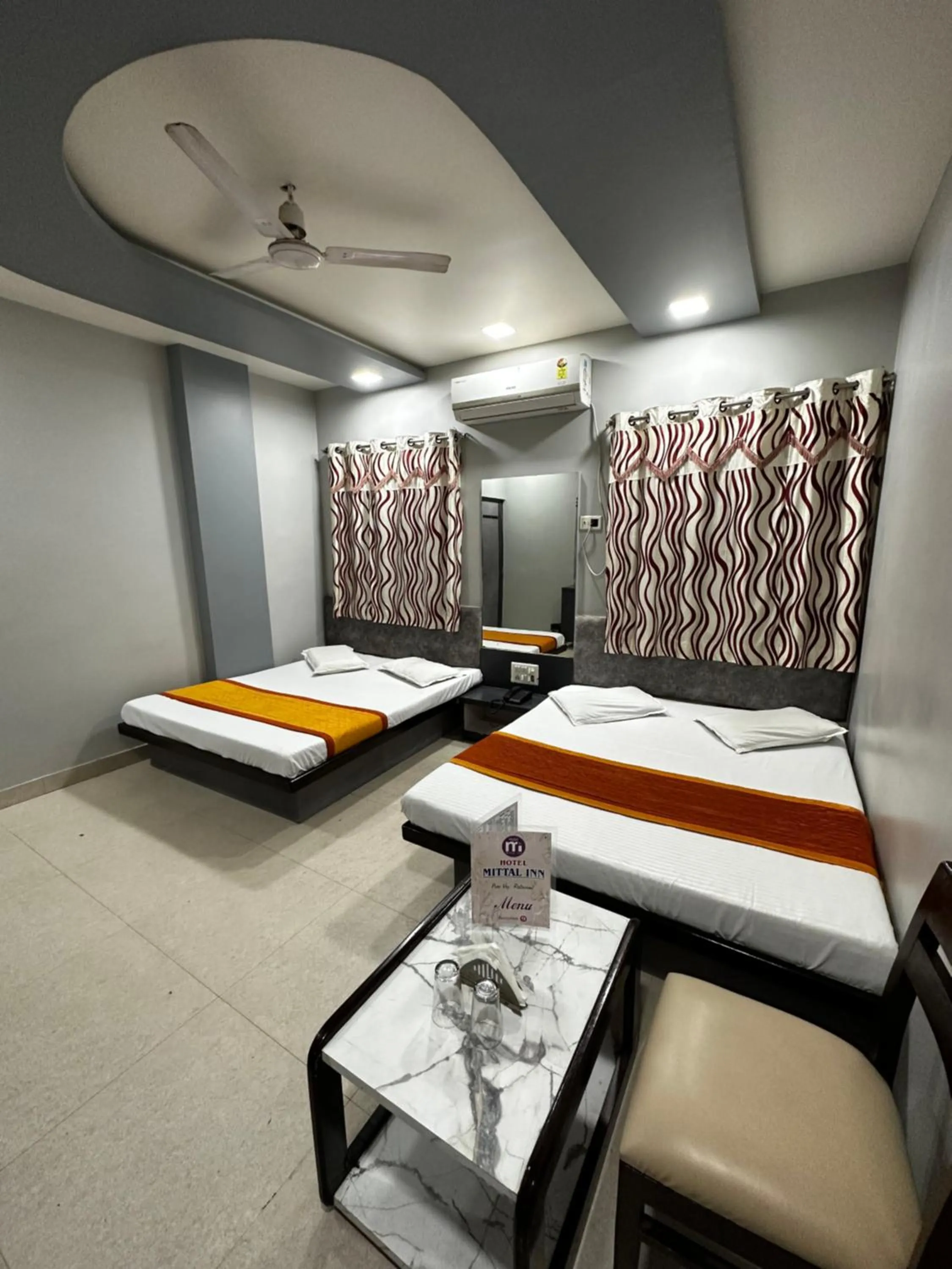 Bed in Hotel Mittal Inn