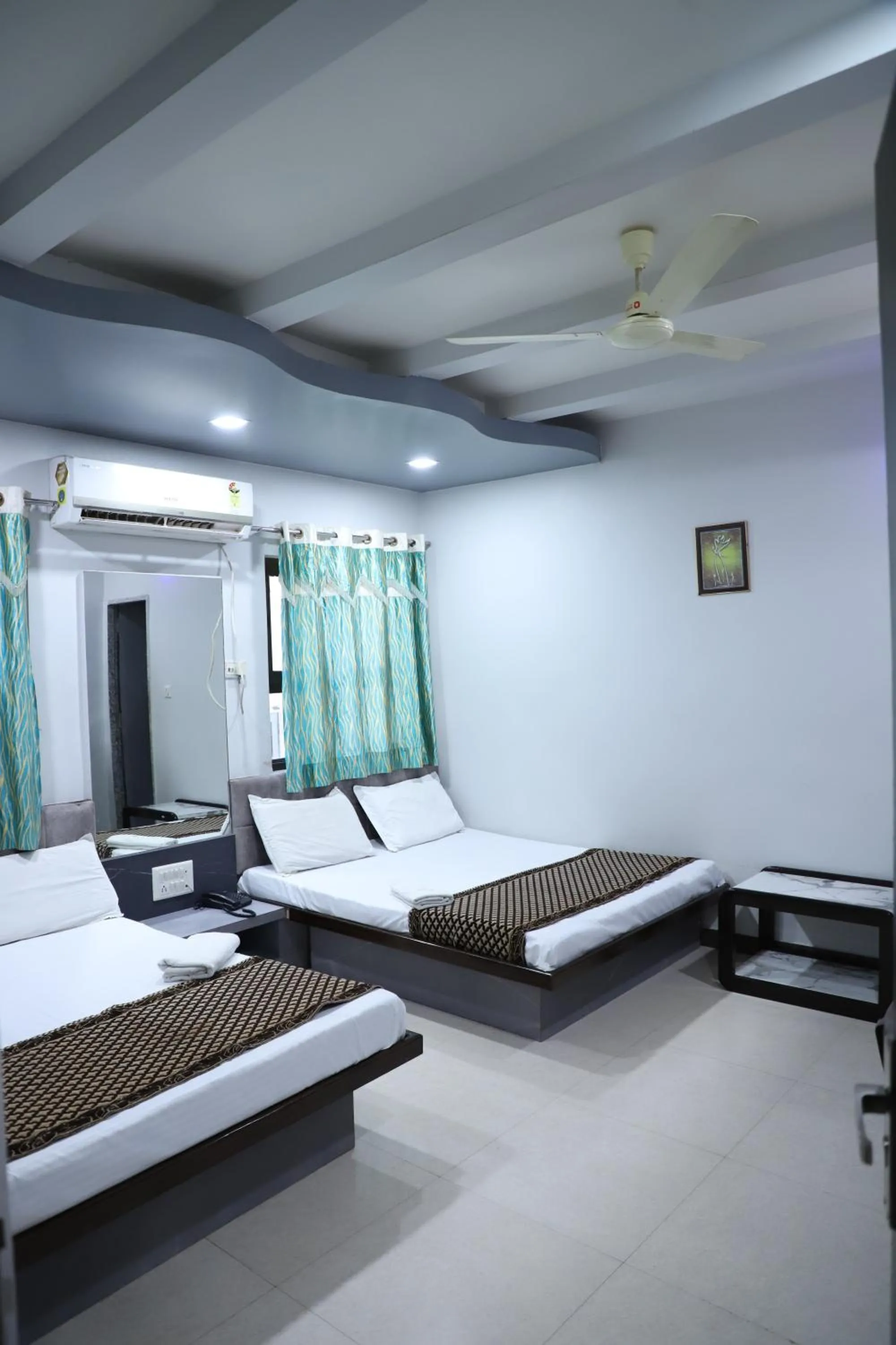 Bed in Hotel Mittal Inn