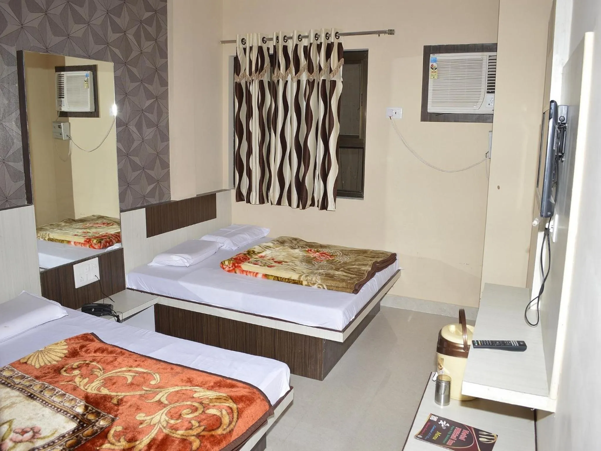 Photo of the whole room, Bed in Hotel Mittal Inn