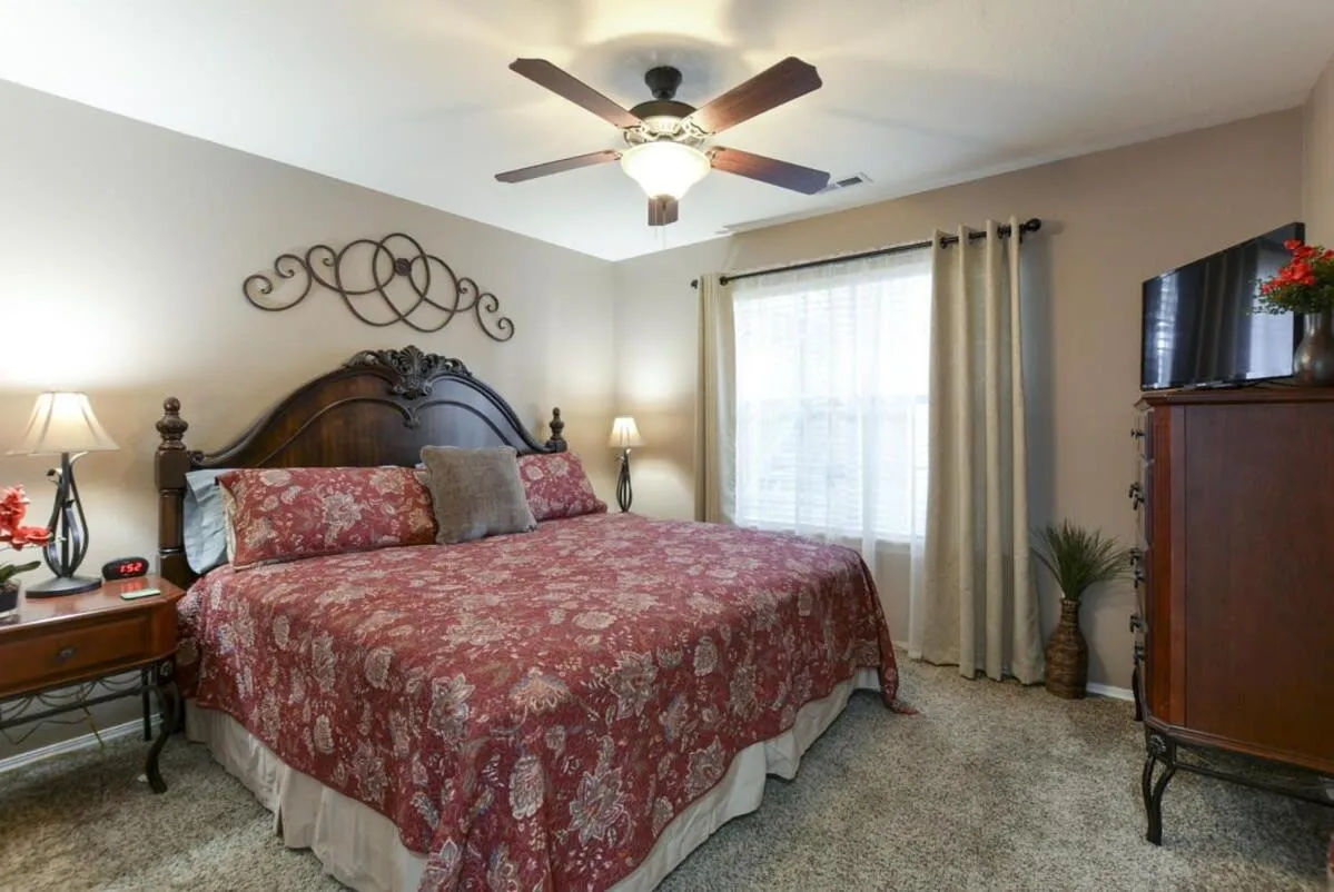 Bed in Little House on the Fairway- Luxury Golf Condo