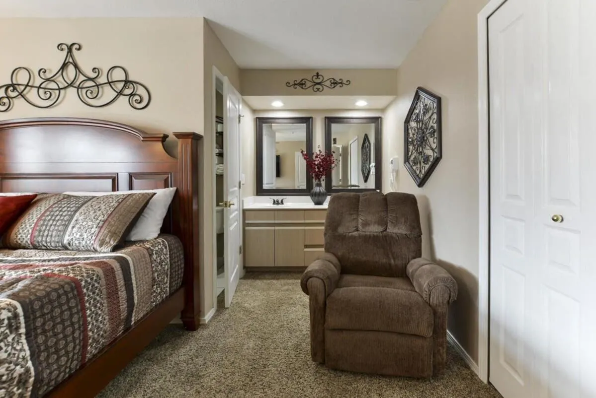 Bed in Little House on the Fairway- Luxury Golf Condo