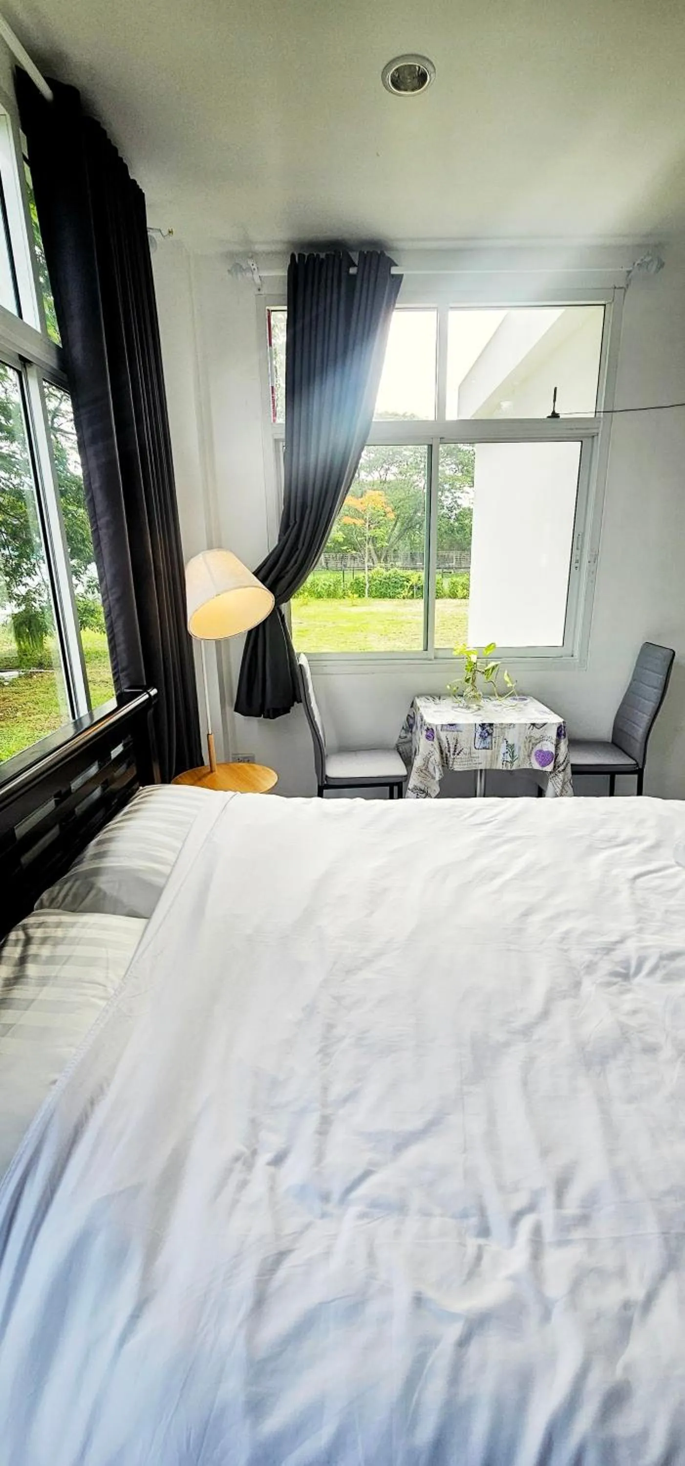 Seating area, Bed in Tiny Island Lake Lodge