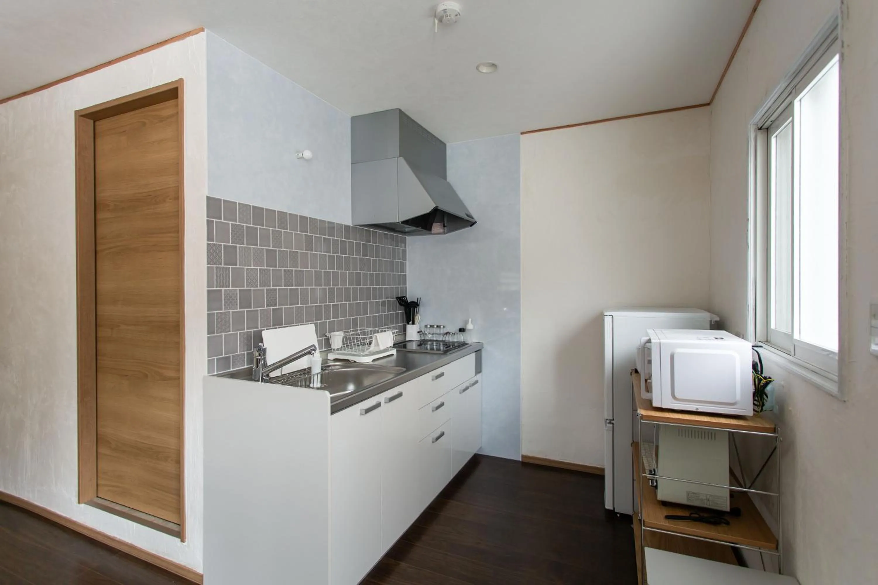 Kitchen or kitchenette in The Apartment Hotels YAMA