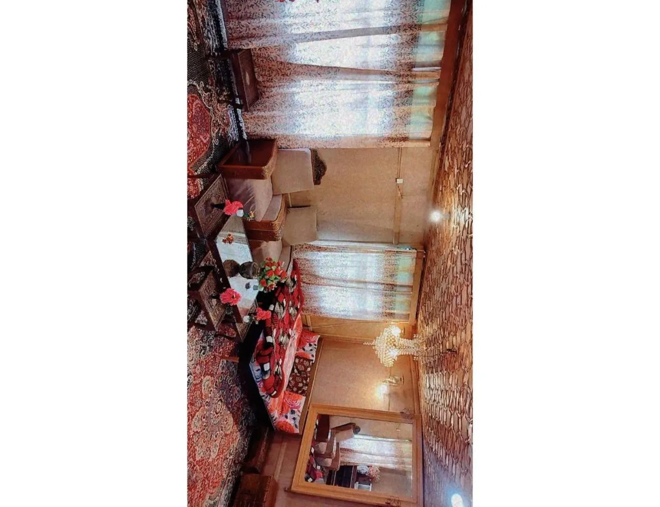 Living room in Taj Palace Houseboat, Srinagar