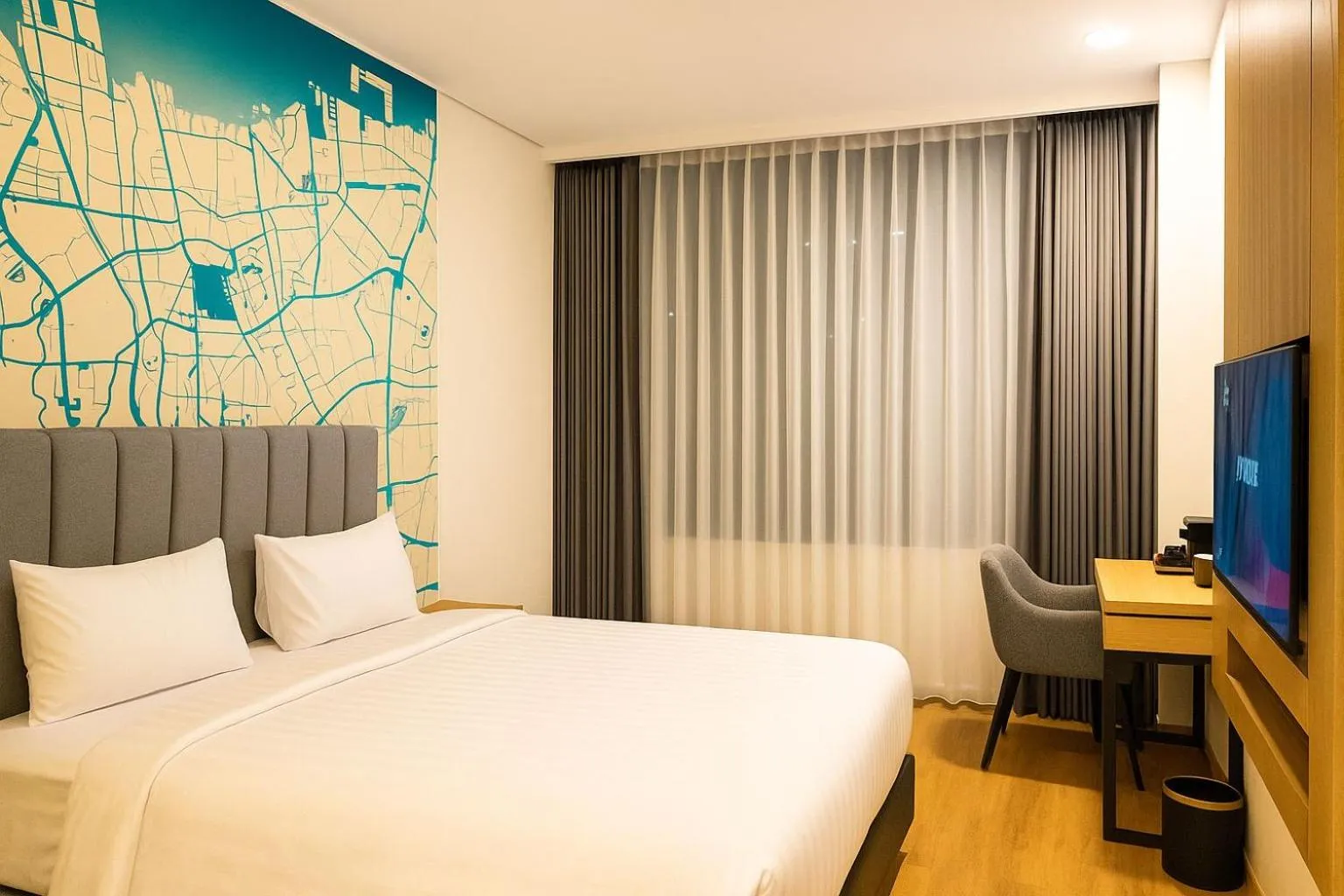 Bed in QNZ Hotel Jakarta