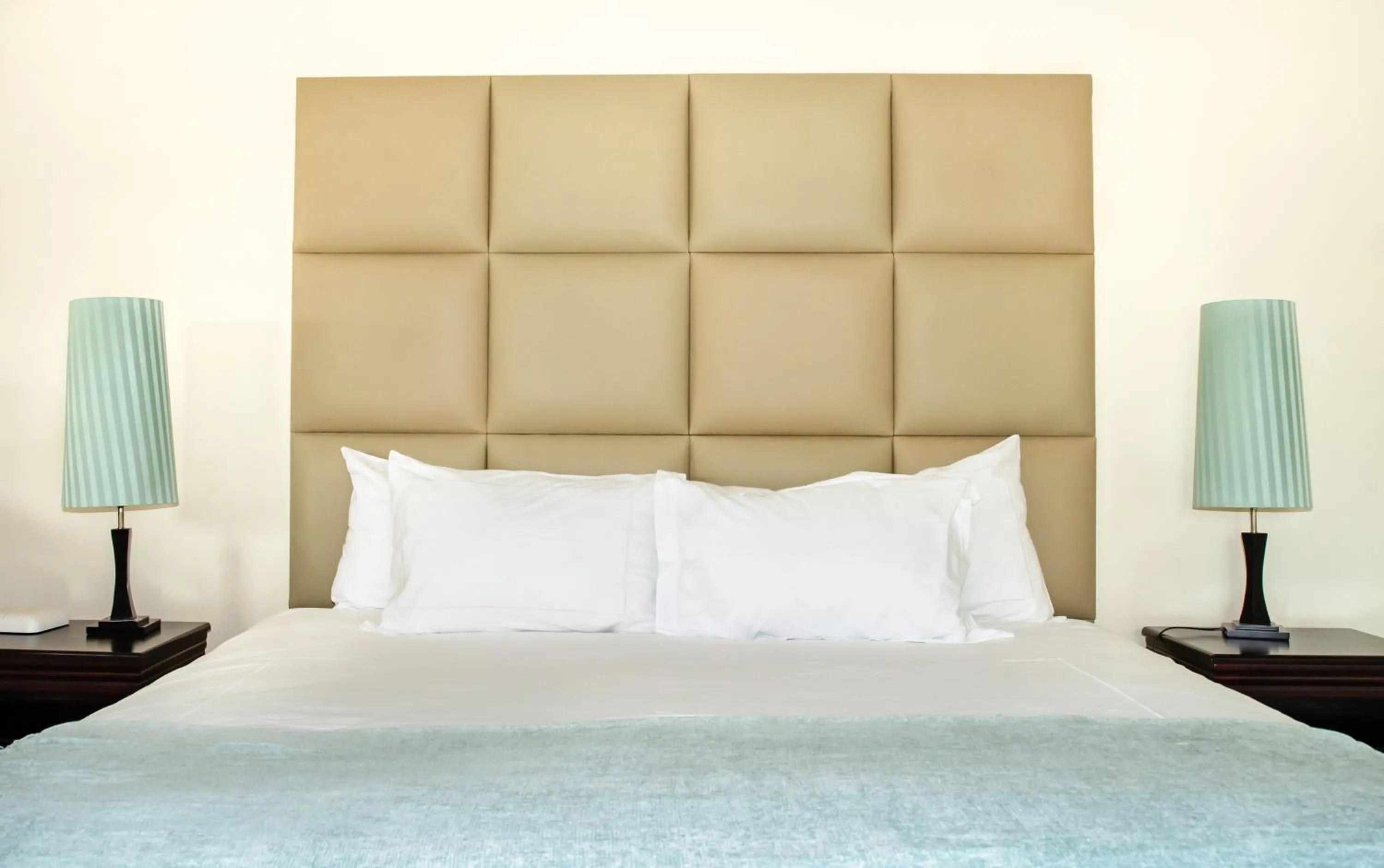 Bed in Gardenia Boutique Hotel