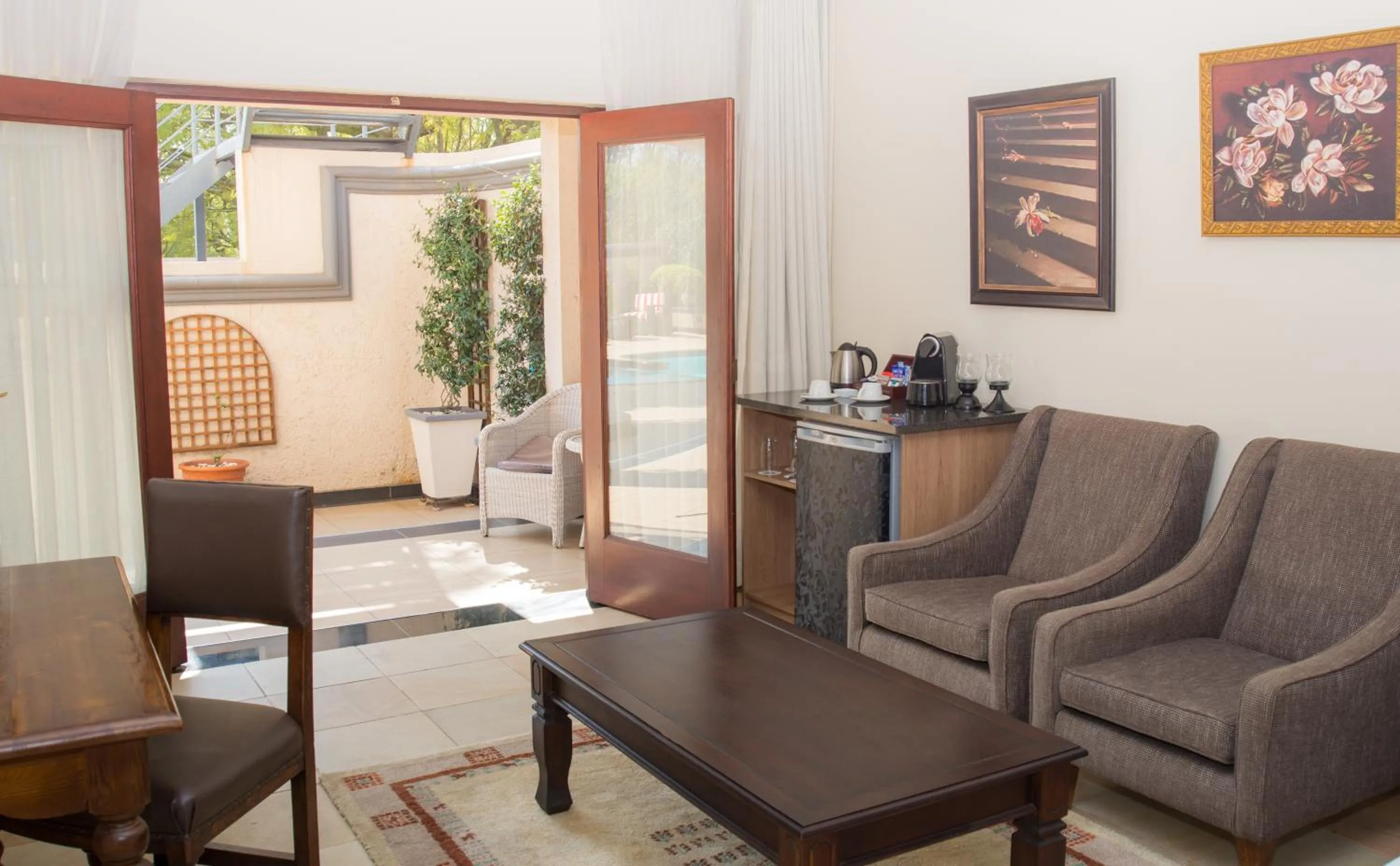 Seating area in Gardenia Boutique Hotel