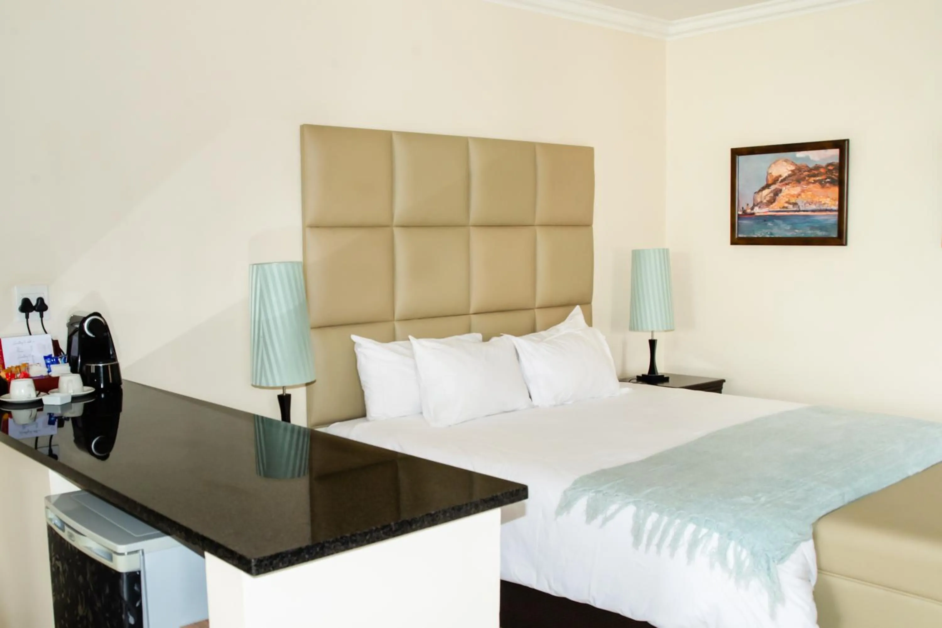 Bed in Gardenia Boutique Hotel