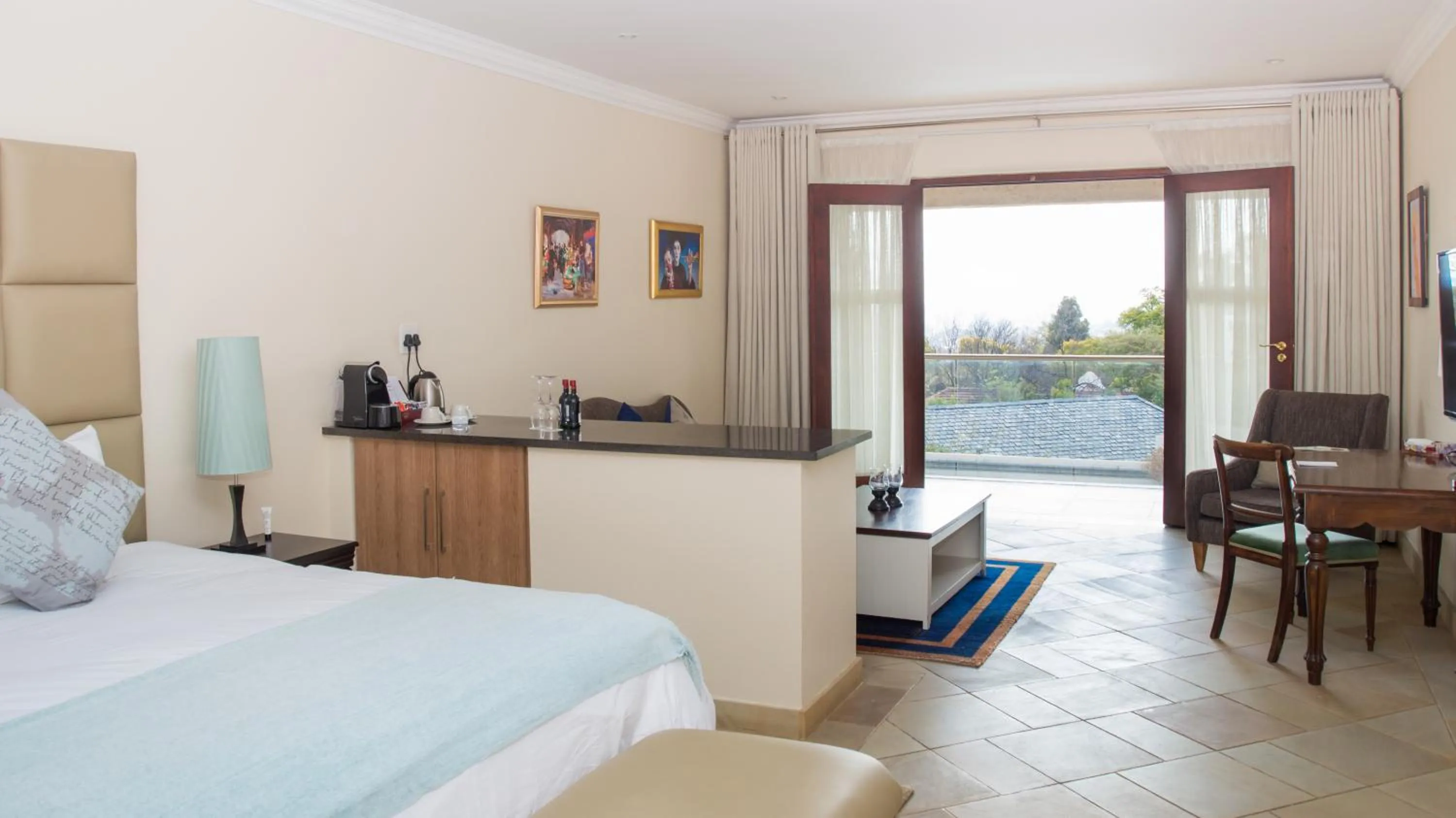 Seating area, Bed in Gardenia Boutique Hotel