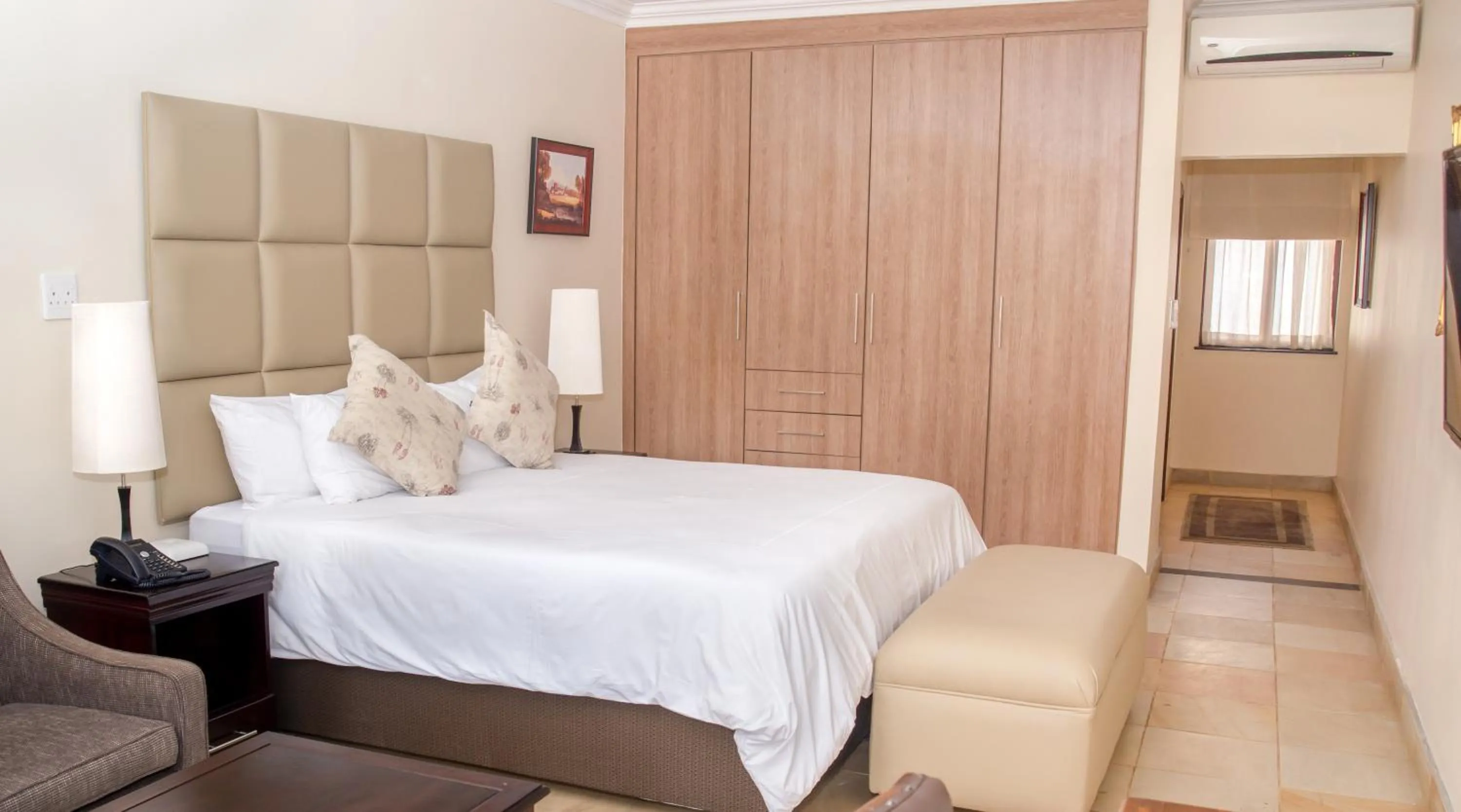 Seating area, Bed in Gardenia Boutique Hotel